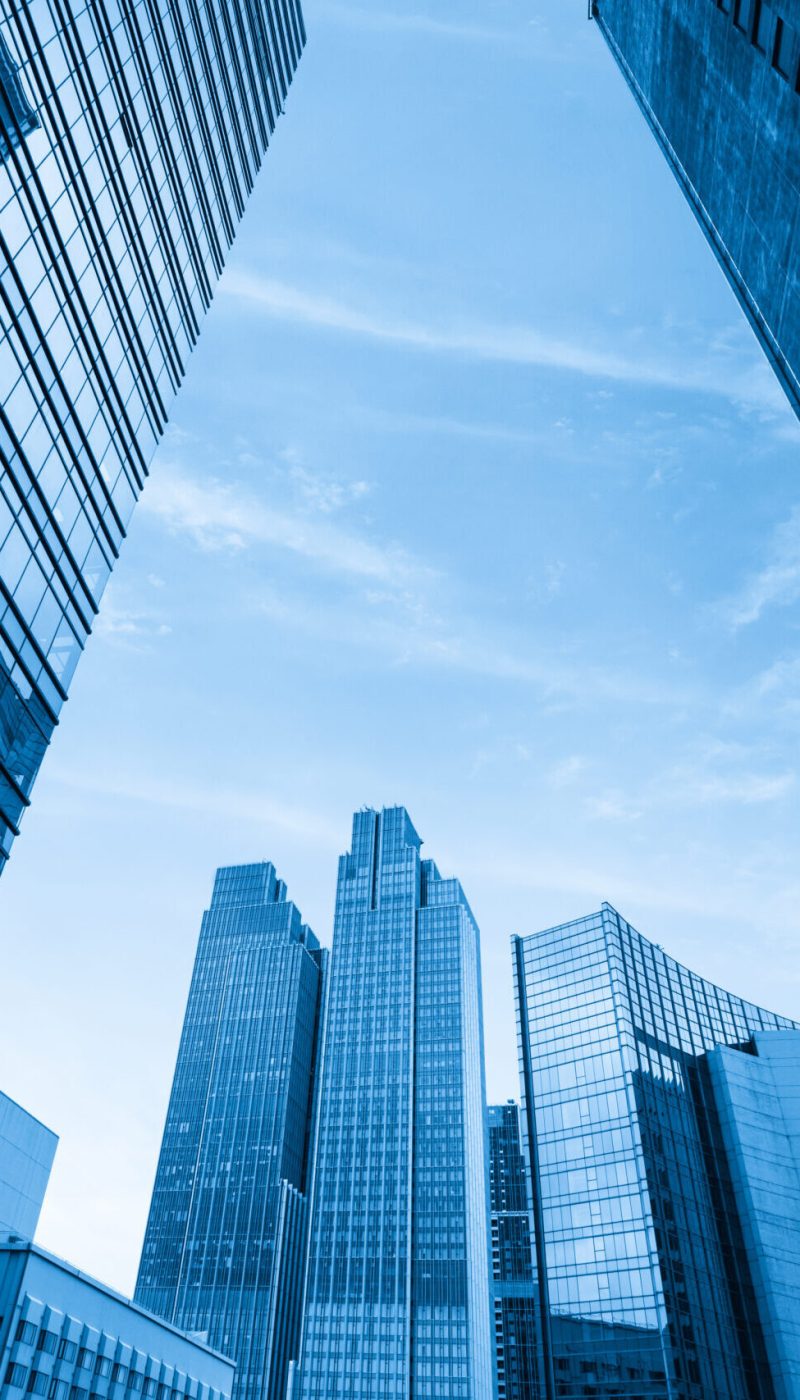 Looking,Up,Blue,Modern,Office,Building
